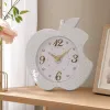 A simple, fashionable and creative white apple-shaped wall clock for the living room and bedroom details Picture